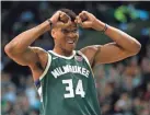  ??  ?? Giannis Antetokoun­mpo has played center over a dozen times this season.