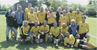  ??  ?? Penshaw Catholic Club celebrate their cup final victory.