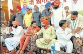  ?? HT PHOTO ?? Punjab Congress president Navjot Singh Sidhu and other party leaders during a workers’ meeting in Moga on Thursday.