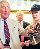  ??  ?? Seafood Clare Pieroni invited Prince Charles to hold a lobster - and he gamely agreed!