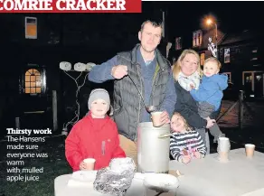  ??  ?? Thirsty work The Hansens made sure everyone was warm with mulled apple juice