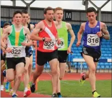  ??  ?? JP Carty on right ( No 316) who came 13th at the British Milers Club Meet in Manchester.