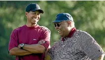  ?? PHOTO: GETTY IMAGES ?? Earl Woods, pictured with Tiger in 2004, comes in for the harshest characteri­sation in the biography.