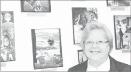  ?? PHOTOS BY STEVE BLAKE ?? Diane Perusse stands in front of her collage art Saturday at the Community Centre in Rock Island.