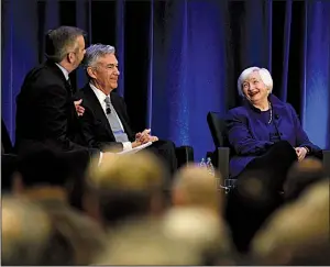  ?? AP/ANNIE RICE ?? Neil Irwin of The New York Times (left) talks with Federal Reserve Chairman Jerome Powell and former Chairman Janet Yellen at a conference Friday in Atlanta.