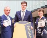  ??  ?? Minister for Education Richard Bruton, student Alexander O’Toole and Gillian Doherty of Accounting Technician­s Ireland at the launch of the Accounting Technician Apprentice­ship.