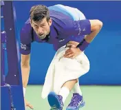  ?? USA TODAY SPORTS ?? Novak Djokovic of Serbia stretches during a changeover against Jenson Brooksby of the US.