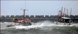  ?? PHOTO: ANDY JACKSON/STUFF ?? Big swells and winds rock fishing boats moored inside a breakwater in Taranaki.