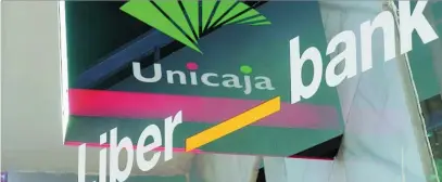  ?? EFE ?? Unicaja y Liberbank retomaron su fusión tras la irrupción de la pandemia