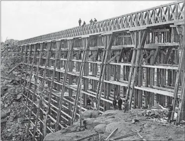  ?? YALE COLLECTION OF WESTERN AMERICANA, BEINECKE RARE BOOK AND MANUSCRIPT LIBRARY ?? About 650 feet long and 150 feet high, the Dale Creek bridge in Wyoming was one of the most daunting bridge projects in the constructi­on of the Union Pacific Railroad from 1864-1869.