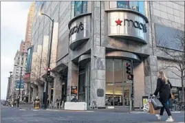  ?? BRIAN CASSELLA/CHICAGO TRIBUNE ?? The Macy’s store inWater Tower Place is seen Tuesday along North Michigan Avenue in Chicago. The store will be closing after a clearance sale.