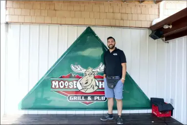  ?? PHOTOS BY ALIAH KIMBRO — THE MORNING JOURNAL ?? Above: Moosehead BBQ Grill owner Josh Hagg poses in newly renovated patio space, shown below.