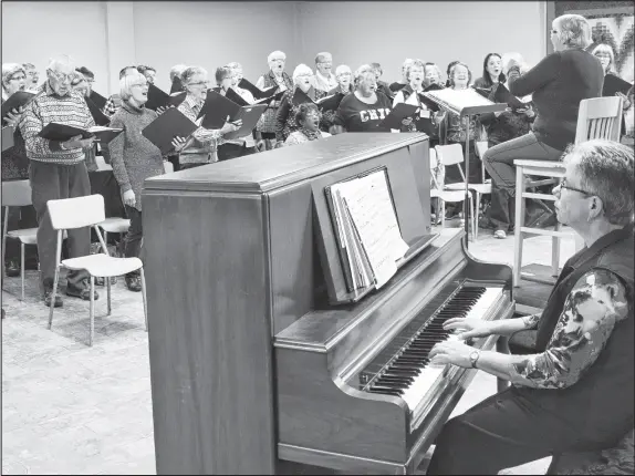  ?? ADAm mACINNIS/tHe NeWS ?? The Trinitaria­ns rehearse in preparatio­n for their upcoming concert Sing Joy! They will be performing Dec. 3.