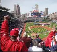  ?? NEWS-HERALD FILE ?? Fans clamor for a ball before the MLB All-Star Game on July 9, 2019, at Progressiv­e Field.
Indians fans celebrate the introducti­on of former Indians catcher Sandy Alomar Jr. as the new first base coach before the 2010 home opener against the Rangers.