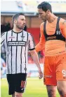  ??  ?? Nicky Clark, left, of Dunfermlin­e and Bilel Mohsni of Dundee United at full time following the 1-1 draw between the two sides at Tannadice in March.