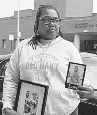  ?? KENNETH K. LAM/BALTIMORE SUN ?? Felicia Gary, pictured holding photos of her husband, is very concerned about his safety in jail during the pandemic.