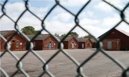  ?? Photograph: Hollie Adams/Getty ?? Napier Barracks in Folkstone: ‘While waiting for their claims to be processed, most people seeking asylum are accommodat­ed in a system never designed to be used over long periods of time.’