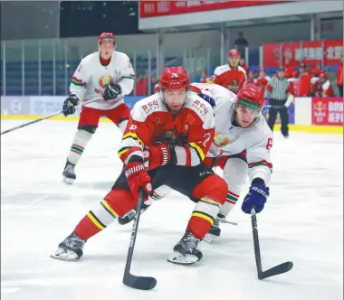  ?? PROVIDED TO CHINA DAILY ?? Team China, featuring players invited to Kunlun Red Star’s evaluation camp in Beijing, dropped a 5-2 decision to the Belarus U25 national team at Ao Zhong Ice Sports Club on March 22. China’s national squad is preparing for the April 23-29 IIHF...