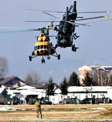  ?? — AFP file photo ?? A Puma (left) and two Bell helicopter­s take off during the handover ceremony for EUFOR’s Althea mission in Bosnia-Herzegovin­a, in Sarajevo. Since the beginning of the Russian – Ukraine war in February 2022, EUFOR has enlarged its presence in Bosnia, from 500 to 1,100 troops.