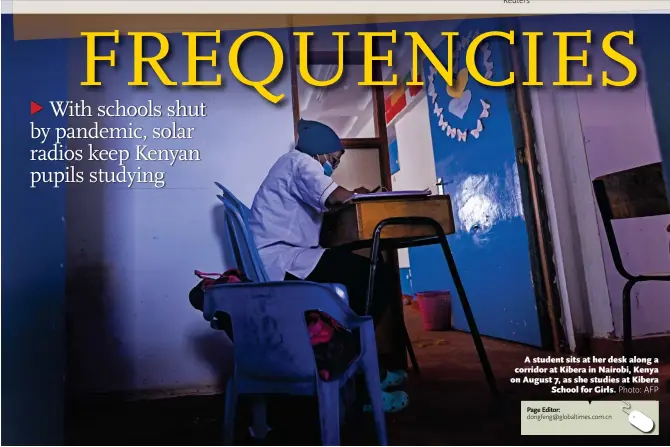  ?? Photo: AFP ?? A student sits at her desk along a corridor at Kibera in Nairobi, Kenya on August 7, as she studies at Kibera School for Girls.