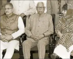  ?? PTI ?? Jammu and Kashmir Governor NN Vohra (centre) with chief minister Mehbooba Mufti and deputy chief minister Kavinder Gupta at the swearingin ceremony after the cabinet reshuffle, Jammu, April 30