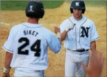  ?? THOMAS NASH - DIGITAL FIRST MEDIA ?? Norchester’s Leif Wergeland, right, celebrates with Jordan Siket after scoring the go-ahead run in the bottom of the sixth inning Saturday.