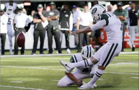  ?? FRANK FRANKLIN II — THE ASSOCIATED PRESS ?? Chandler Catanzaro, right, was previously the Jets’ kicker during the 2017 season.
