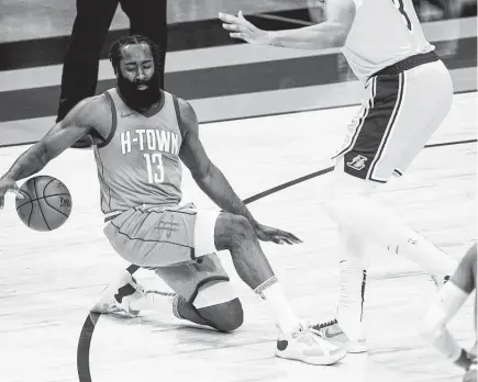  ?? Mark Mulligan / Staff photograph­er ?? Everything has changed since James Harden’s final appearance with the Rockets in January, the last time they played the Lakers.