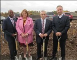  ?? SUBMITTED PHOTO BY BILL SANSERVINO ?? Ewing Council Vice President Kevin Baxter, Councilwom­an Jennifer KeyesMalon­ey, Mayor Bert Steinmann and Charles Latini, Township Planning and Zoning Officer, celebrated the Nov. 2, 2018 groundbrea­king of the Ewing Town Centre on the old General Motors site on Parkway Avenue.