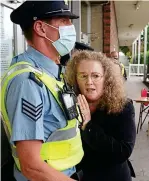  ?? ?? Mask flouting: Dolores Cahill is barred entry to a count centre