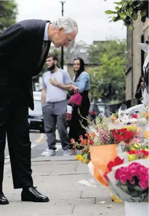  ??  ?? LEADING: Sir Martin Moore-Bick during his visit to north Kensington yesterday