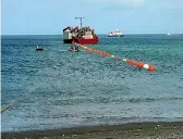  ??  ?? The re-laying of a new part of a Cook Strait power cable in March 2005.