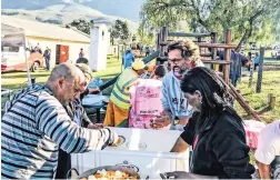  ?? PICTURE: HEART FM ?? BRINGING HOPE: The Heart FM team visited Genadendal, where they built a container school to house Voorstekra­al Educare.