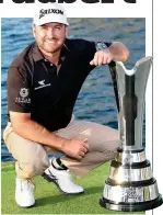  ?? GETTY IMAGES ?? Champion: McDowell shows off his silverware