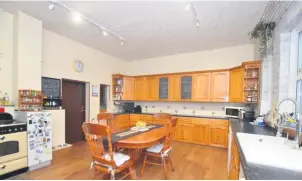  ??  ?? Big kitchen The farmhouse style of this 16 ft 2ins by 16 ft 2ins hub of Glenalty