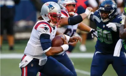  ??  ?? Cam Newton scored two rushing touchdowns against the Seahawks but could not guide his team pastSeattl­e. Photograph: Joe Nicholson/ USA Today Sports