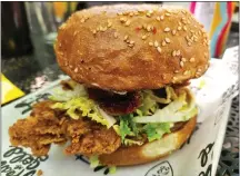  ?? PHOTOS BY MARK KOESTNER — FOR THE NEWS-HERALD ?? The Obligatory Fried Chicken suggests Heart of Gold recognizes that, yes, you must have a chicken sandwich on your menu these days.