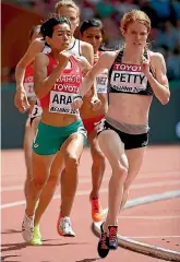  ??  ?? Angie Petty in action during the 800m heats at the 2015 world track and field championsh­ips in Beijing.