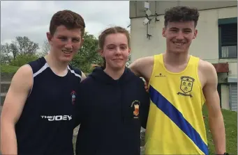  ??  ?? Tadgh Donnelly, Kate O’Reilly and Cormac Canning of Drogheda & District AC at the North Leinster Schools Track and Field Championsh­ips in Santry.