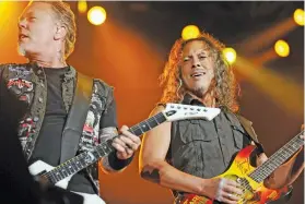  ?? Pictures: Gallo/Getty Images ?? SCREAMERS. Metallica’s lead singer James Hetfield and guitaritst Kirk Hammet during the group’s concert at FNB Stadium in Soweto in 2013.