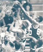 ?? BALTIMORE SUN PHOTO ?? Navy’s David Robinson fights for a rebound in February of 1985. A month later Robinson scored 22 against Maryland in the NCAA Tournament. The Terps won 64-59.