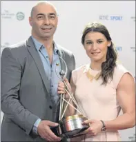  ??  ?? Pete and Katie Taylor pose for the cameras after Katie picked up the RTE Sports Person of the Year award.