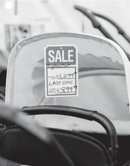  ?? Joyce Kim / New York Times ?? A baby stroller is marked as the last available of the model at Juvenile Shop, a family-run retailer, in Los Angeles. Expectant parents have felt shipping delays.