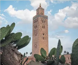  ?? DANIEL RODRIGUES NEW YORK TIMES ?? The Koutoubia Mosque. Marrakech has stayed both exciting and accessible for travelers.