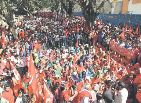  ?? — AFP photo ?? Activists with the Centre of Indian Trade Unions (CITU) and labourers shout slogans at a rally in support of a nationwide general strike called by trade unions aligned with opposition parties to protest the Indian government’s economic policies in Bangalore.