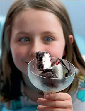  ?? ROSS GIBLIN ?? Choc-dipped ice cream blocks are a little fiddly to make but will bring a smile to any kid’s face.