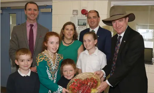  ??  ?? Bree NS pupils, along with principal Mark Kelly, Minister Paul KehoeTD and deputy principal Anne O’Dowd, makiing a special presentati­on to the Australian Ambassador Richard Andrews during his recent visit to the school.