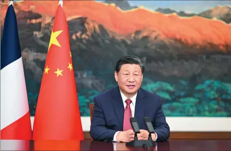  ?? LI XUEREN / XINHUA ?? President Xi Jinping delivers a video address to a reception celebratin­g the 60th anniversar­y of the establishm­ent of diplomatic ties between China and France in Beijing on Thursday.