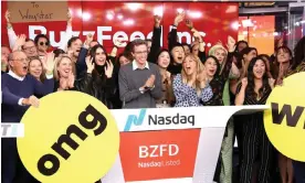  ?? Photograph: Bennett Raglin/Getty Images for BuzzFeed Inc. ?? BuzzFeed founder Jonah Peretti (centre) celebrates the publisher’s Nasdaq public listing with team members in 2021.