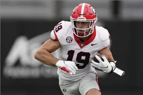  ?? GEORGE WALKER IV — THE ASSOCIATED PRESS ?? Georgia tight end Brock Bowers runs with the ball after a catch against Vanderbilt in the first half of an NCAA football game on Saturday, Oct. 14, 2023 in Nashville, Tenn.